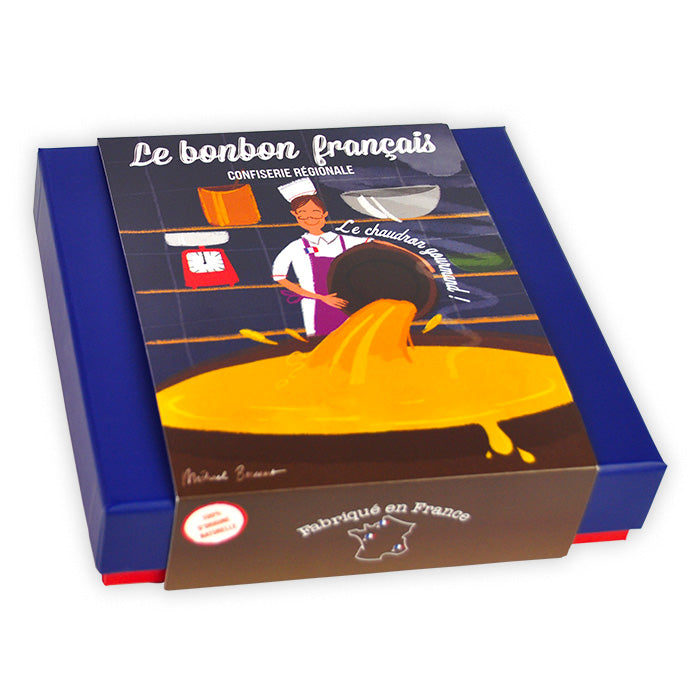 "Coffret Prestige Le Chaudron Gourmand avec fourreau : illustration d'un confiseur renversant sa pâte de bonbons depuis son chaudron, logo Le Bonbon Français